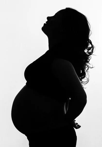 Silouette för en gravid kvinna — Stockfoto