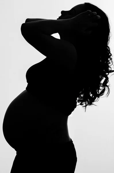 Silouette van een zwangere vrouwen — Stockfoto