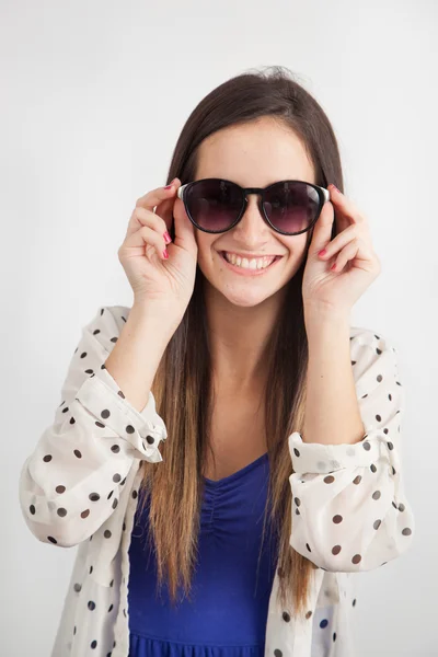 Portrait of a young woman with sunglasses — Stock Photo, Image