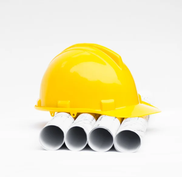 Rolls of architectural projects and construction tools — Stock Photo, Image