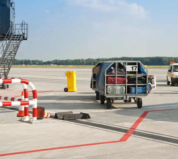 Airplanes parked at the gates to the airfield terminal Royalty Free Stock Images