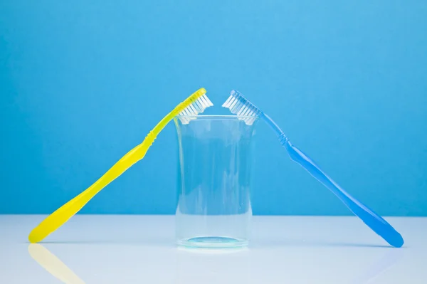 Colorful toothbrushes and dentistry concept — Stock Photo, Image