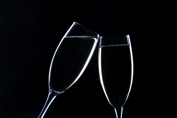 Champagne glas över svart bakgrund — Stockfoto