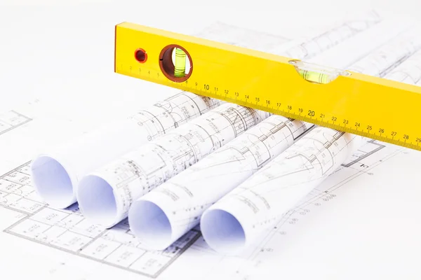 Construction level and blueprints Stock Picture