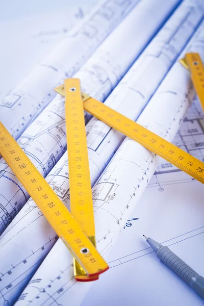 Architectural drawings and construction tools Royalty Free Stock Photos