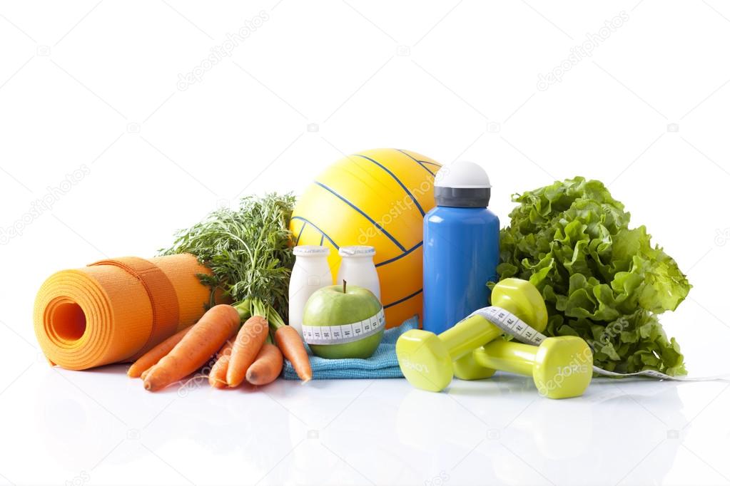 Healthy food and sport equipment isolated on white