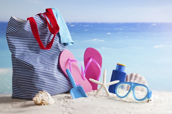 Beach bag with beach accessories — Stock Photo, Image