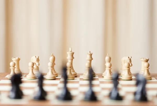 Chess pieces set on a chessboard — Stock Photo, Image