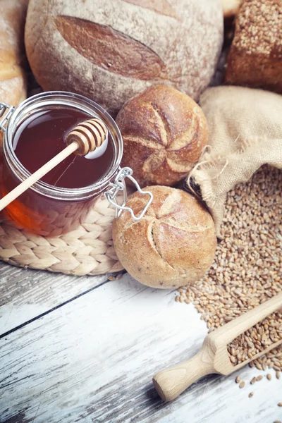 Ingredients for cooking, eggs, honey, bread, flour and milk — Stock Photo, Image