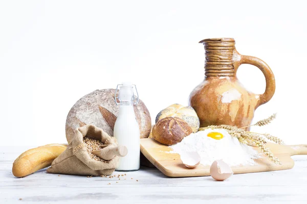 Vintage jug, bread and  seeds,isolated — Stock Photo, Image