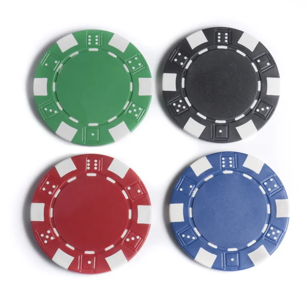 Four isolate colorful poker chips — Stock Photo, Image
