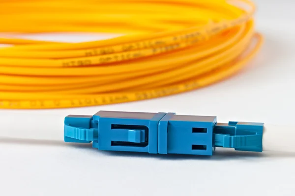 Macro Fiber optic patchcord on white background — Stock Photo, Image