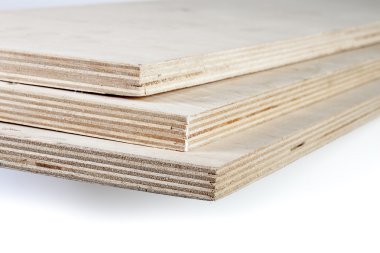 Three light plywood boards stacked clipart