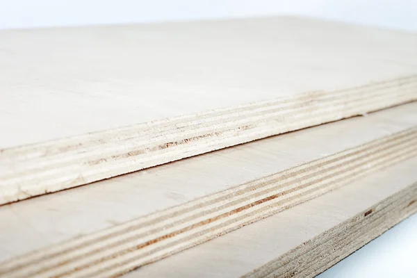 Three light plywood boards stacked — Stock Photo, Image
