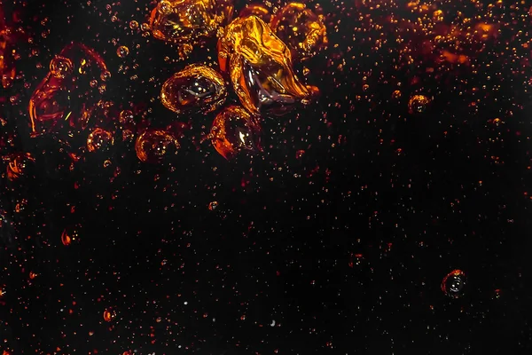 Macro bubble and foam  on the glass wall of cola — Stock Photo, Image