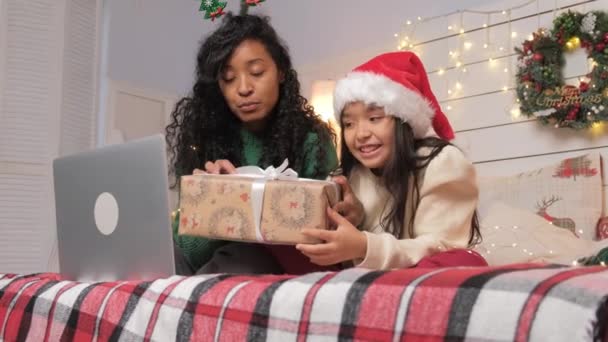 Mother and daughter chat and show presents via video call — Video