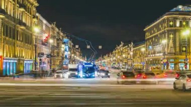 Evening car traffic in the city center at the time lapse intersection