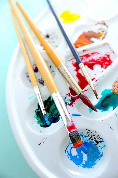 Watercolor tray and paint brush — Stock Photo, Image