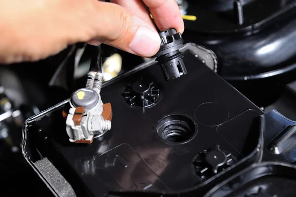 Car user open the battery cap — Stock Photo, Image