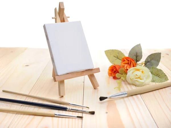 Blank canvas on easel — Stock Photo, Image