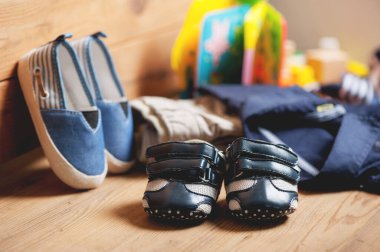 closeup little blue shoes for baby, baby clothing, baby accessories