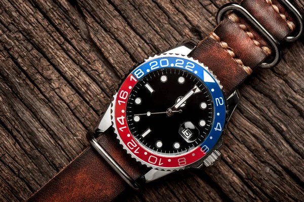 Closeup Luxury Wristwatch Men Black Dial Blue Red Bezel Leather — стоковое фото