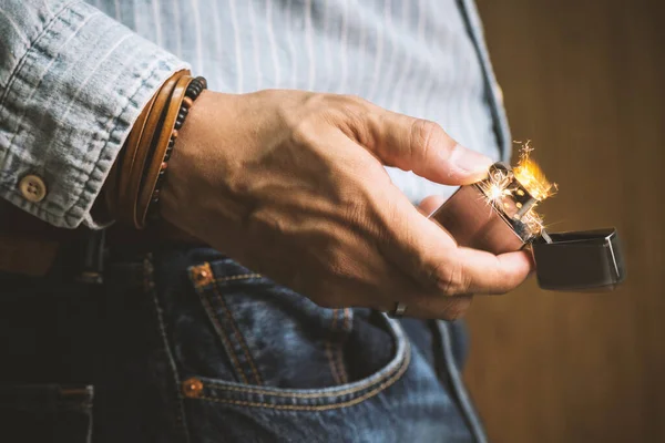 Man Sparking His Brushed Chrome Lighter Windproof — Stock Photo, Image