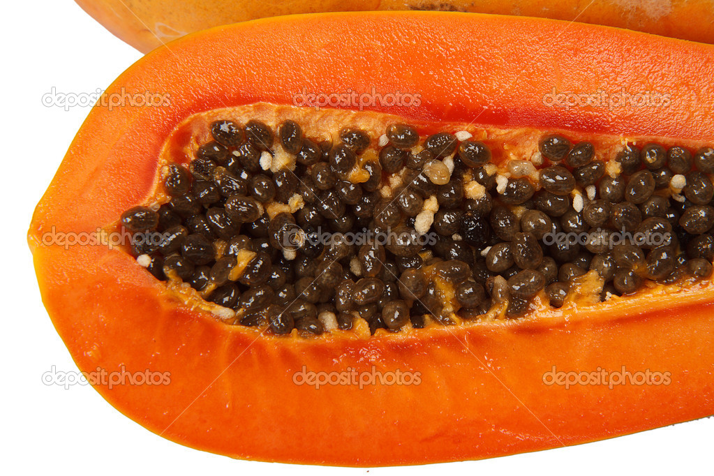 Cut papaya showing the seeds within