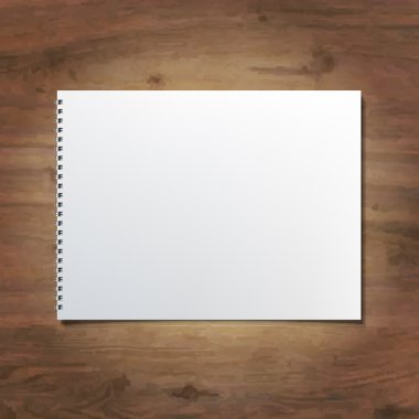 ahşap arka plan üstünde defter