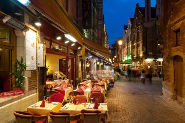 Small cafes on the old streets in Brussels clipart