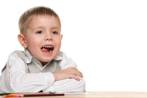 Petit garçon joyeux au bureau — Photo