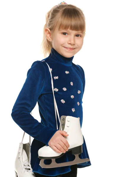 Smiling little girl with skates — Stock Photo, Image