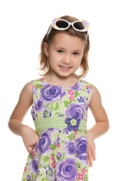 Cheerful little girl looks forward — Stock Photo, Image