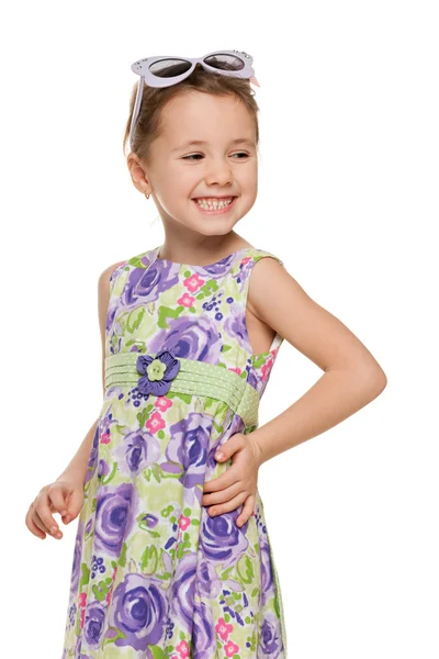 Cheerful little girl looks away — Stock Photo, Image
