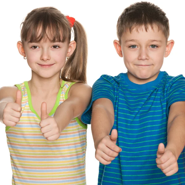 Two children hold their thumbs up — Stock Photo, Image