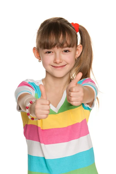 Chica alegre sostiene sus pulgares hacia arriba — Foto de Stock