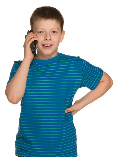 Vrolijke jongen met een mobiele telefoon — Stockfoto