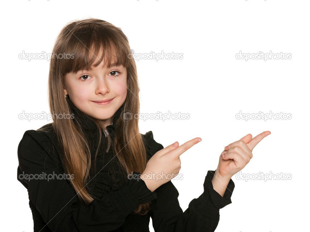 Young girl in black makes hands gesture