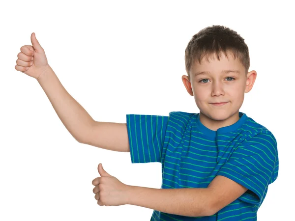 Young boy holds his thumbs up — Stock Photo, Image