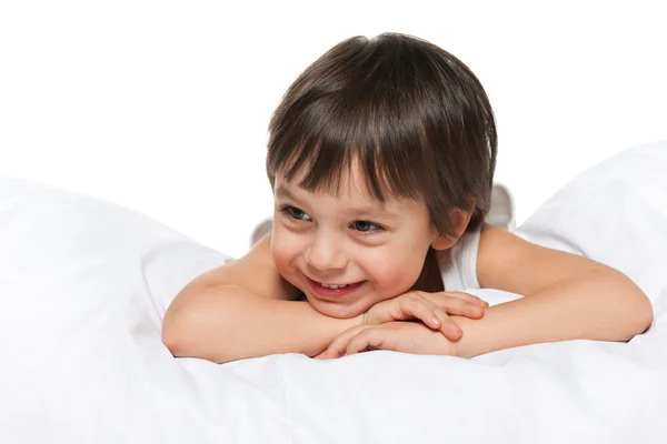 Smiling little boy on the white — Stock Photo, Image