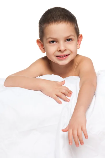 Smiling little boy on the white — Stock Photo, Image