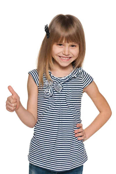 Smiling young girl with her thumb up — Stock Photo, Image