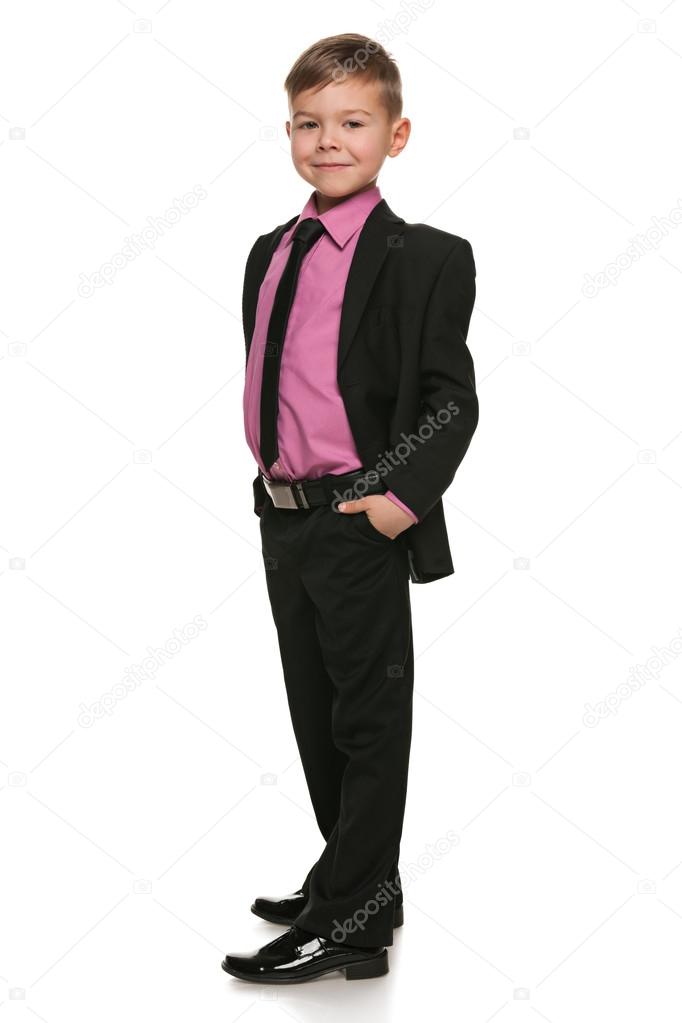 knappe jongen in zwart pak — stockfoto © sergiyn #23344544