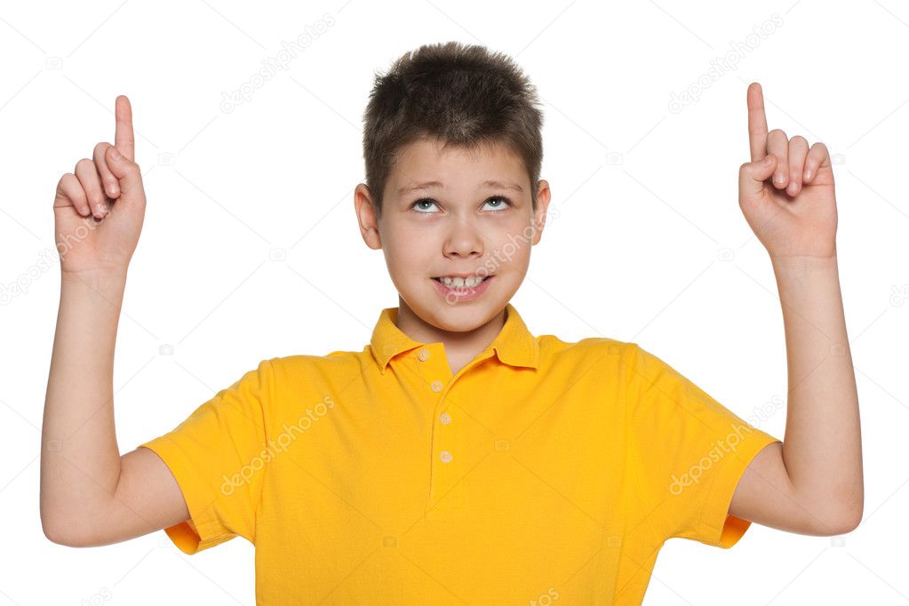 Cheerful boy showing his fingers up