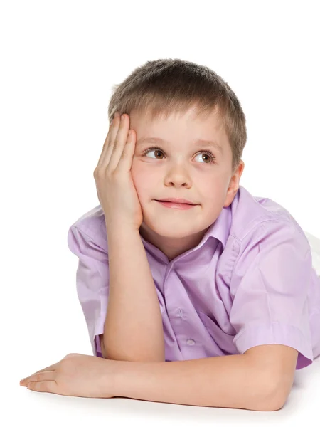 Soñando joven sonriente — Foto de Stock