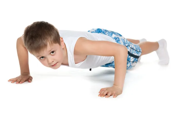 Training young athletic boy — Stock Photo, Image