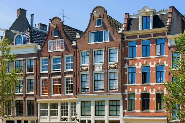 Historiske bygninger i Amsterdam - Stock-foto