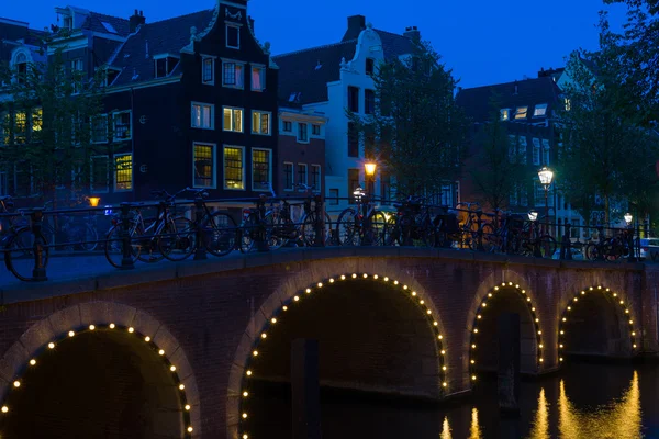 Most amsterdam v noci — Stock fotografie