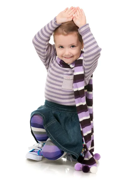 Fashion little girl in striped sweater — Stock Photo, Image