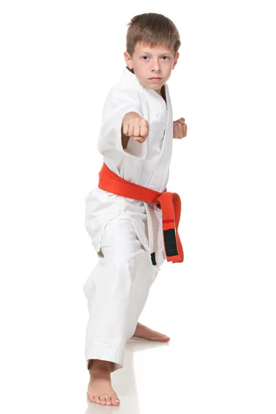 Confident boy in kimono in fighting stance — Stock Photo, Image